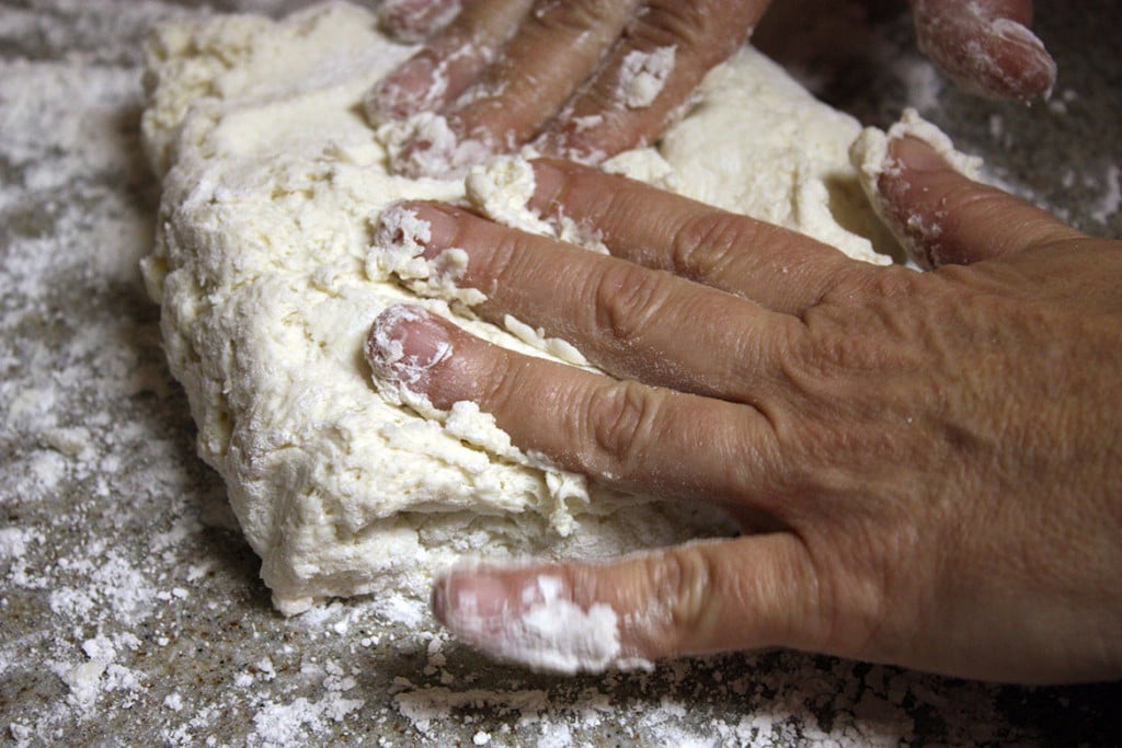 Folding the biscuit dough.