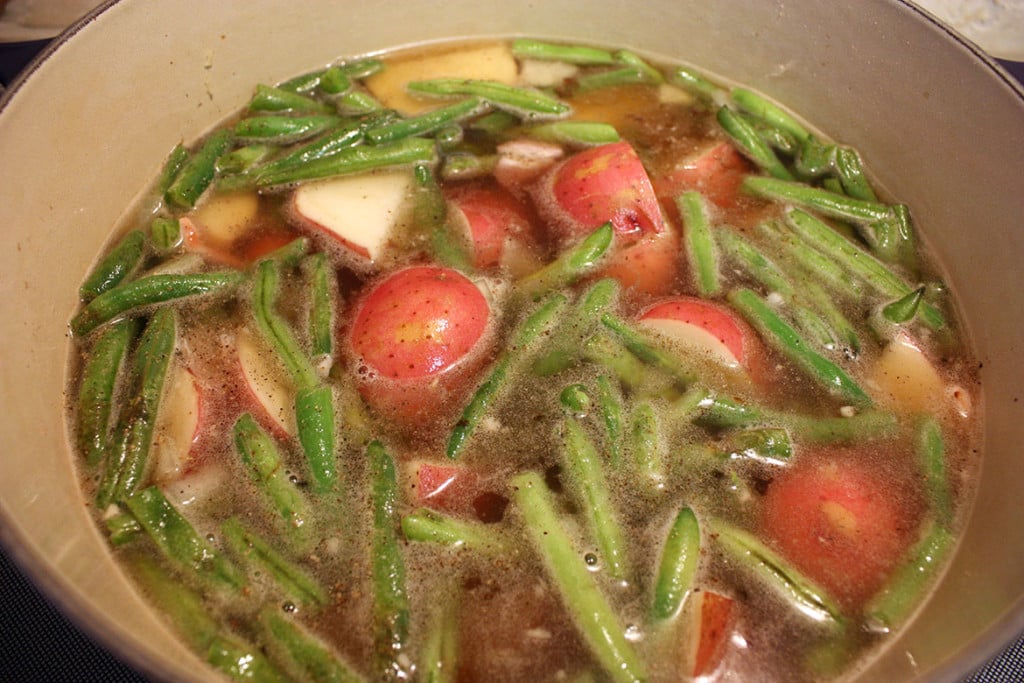 potatoes and green beans in a pot