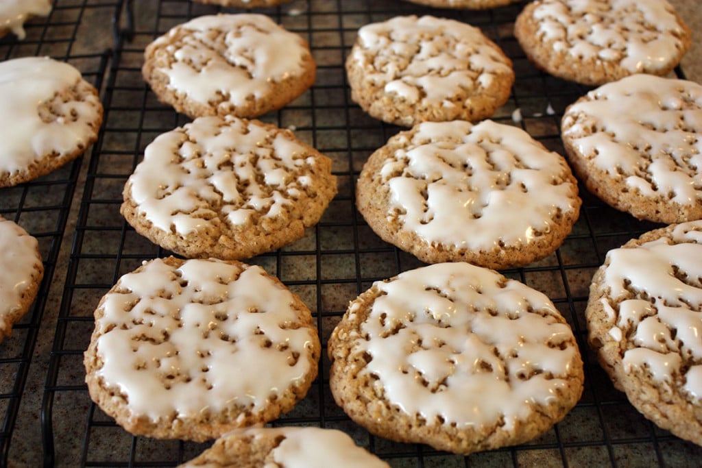 Iced Oatmeal Cookies on a wire rack