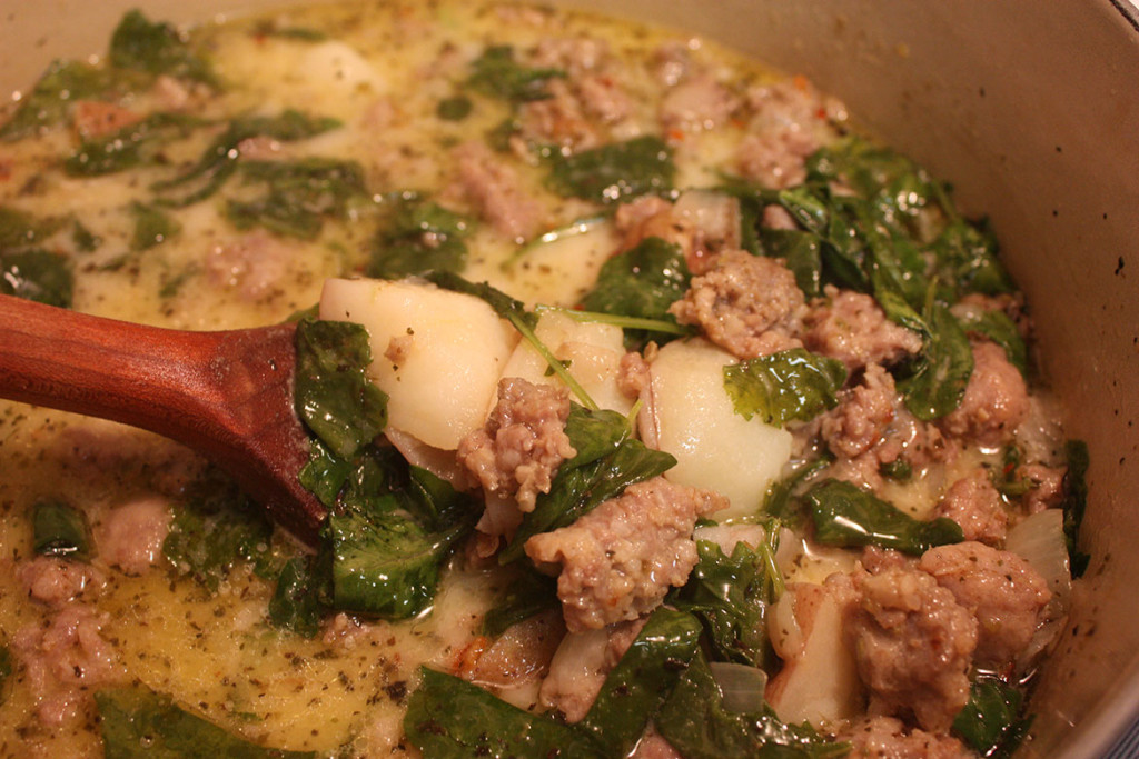 Ladle of the Sausage Potato and Kale Soup.