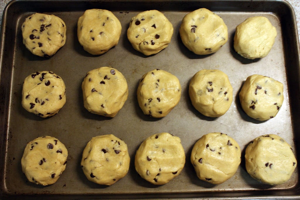 cookie dough balls formed on a baking sheet