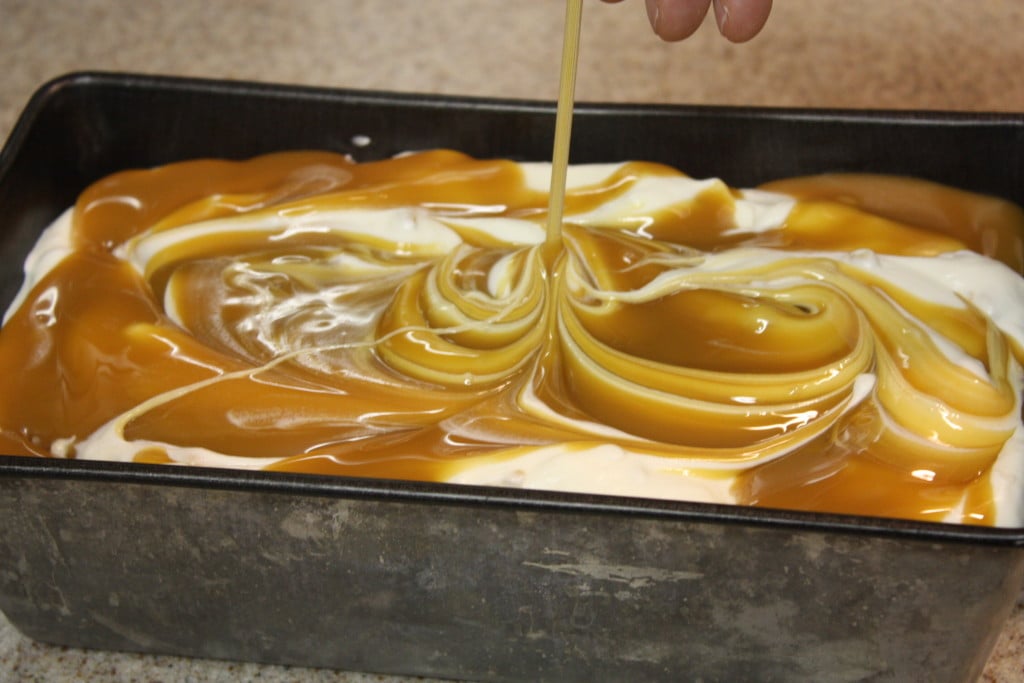 The Salted Caramel being swirled into the ice cream mixture.