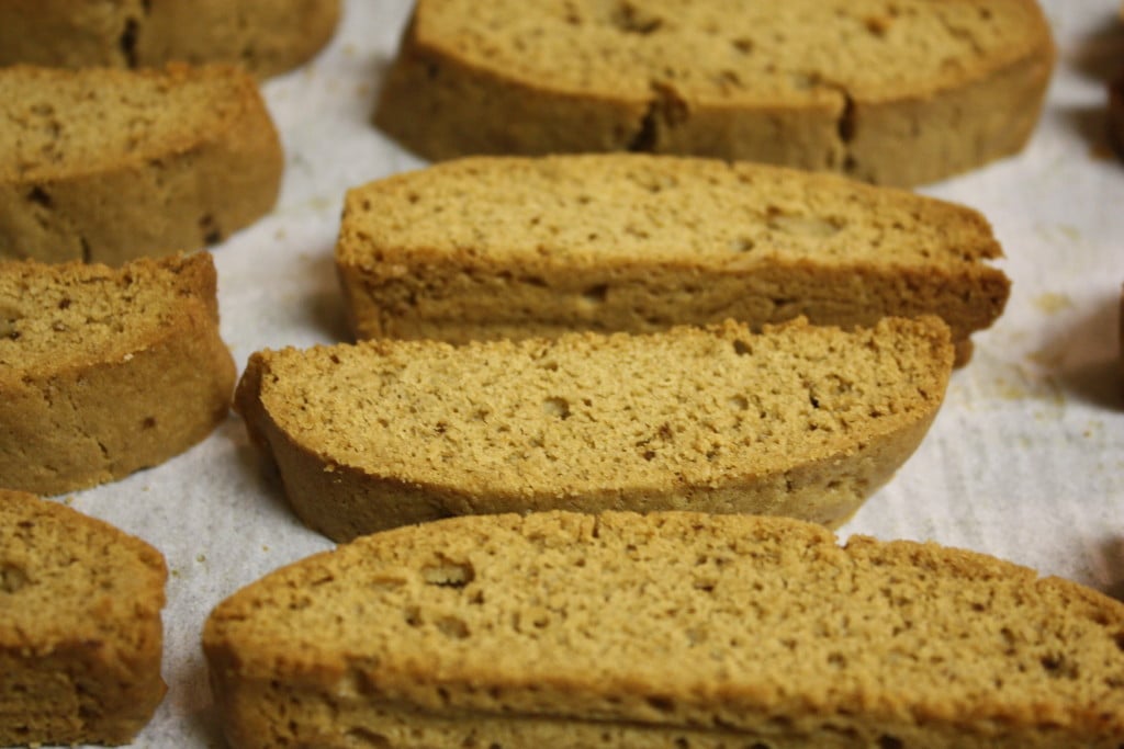 Sliced Espresso Biscotti on a parchment paper lined baking sheet.