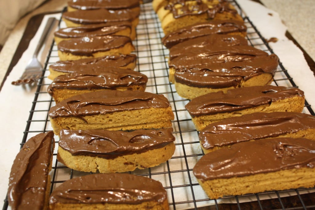 Chocolate dipped Espresso Biscotti on a wire rack.