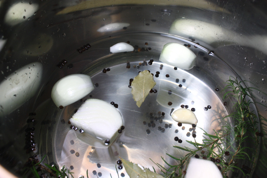 herbs and spices added to the dissolved Turkey Brine in a pot