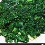 Sauteed kale on a white plate.