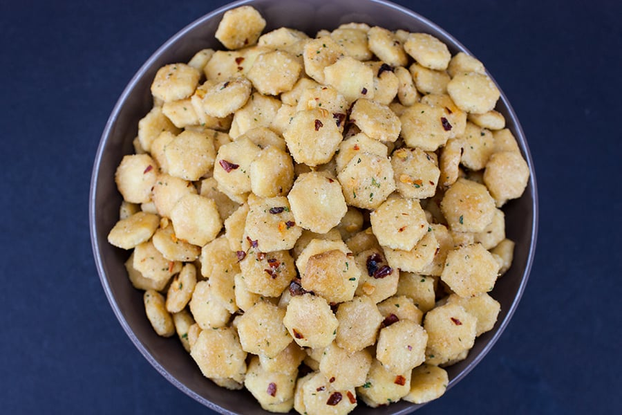 Spicy Seasoned Oyster Crackers in a black bowl