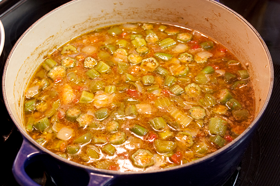 Gumbo cooking in a dutch oven.