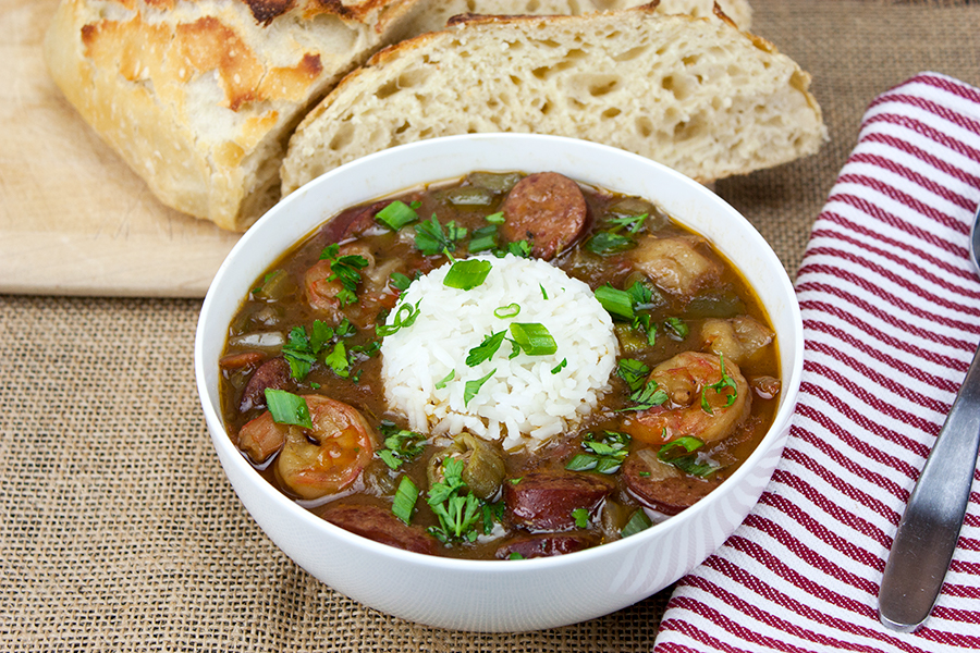 Shrimp and Sausage Gumbo - Our favorite gumbo with rice in a white bowl.