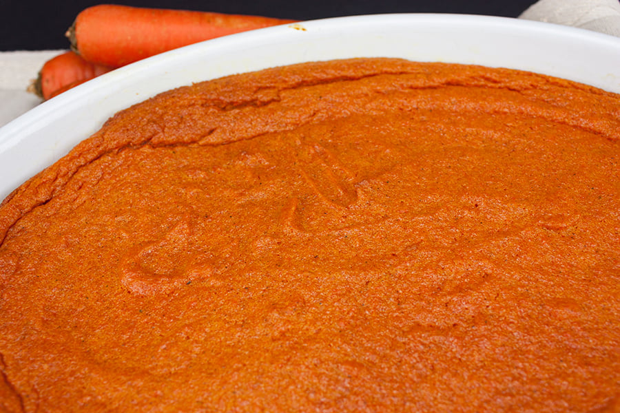 baked Carrot Souffle in a white casserole dish