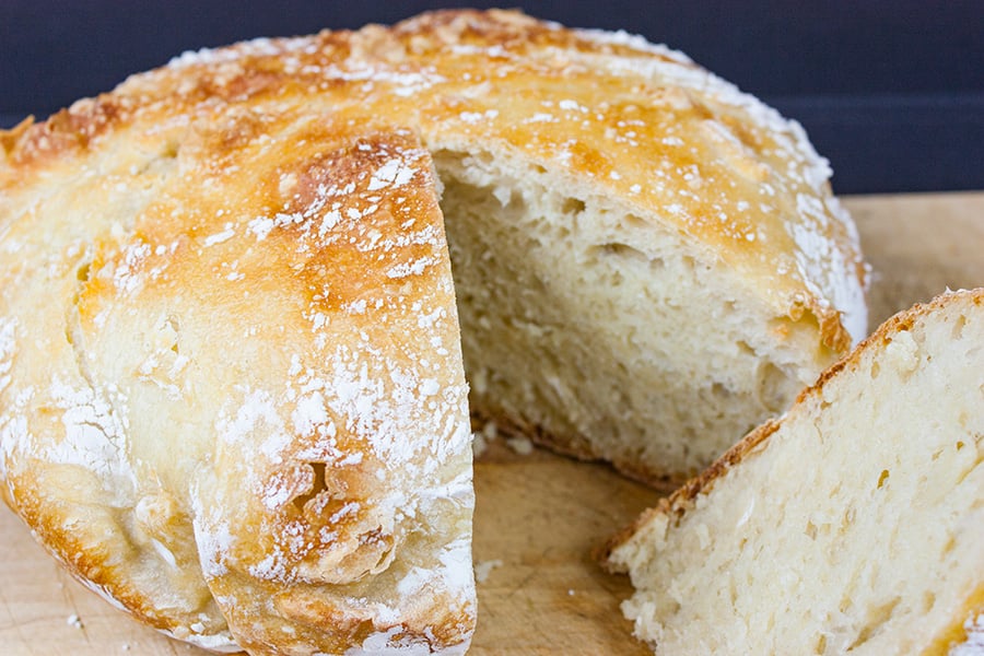 No Knead Large Dutch Oven Artisan Bread - This recipe is perfect for those of us who only own a 5-6 quart dutch oven. The bread rises tall, crispy and crazy good!