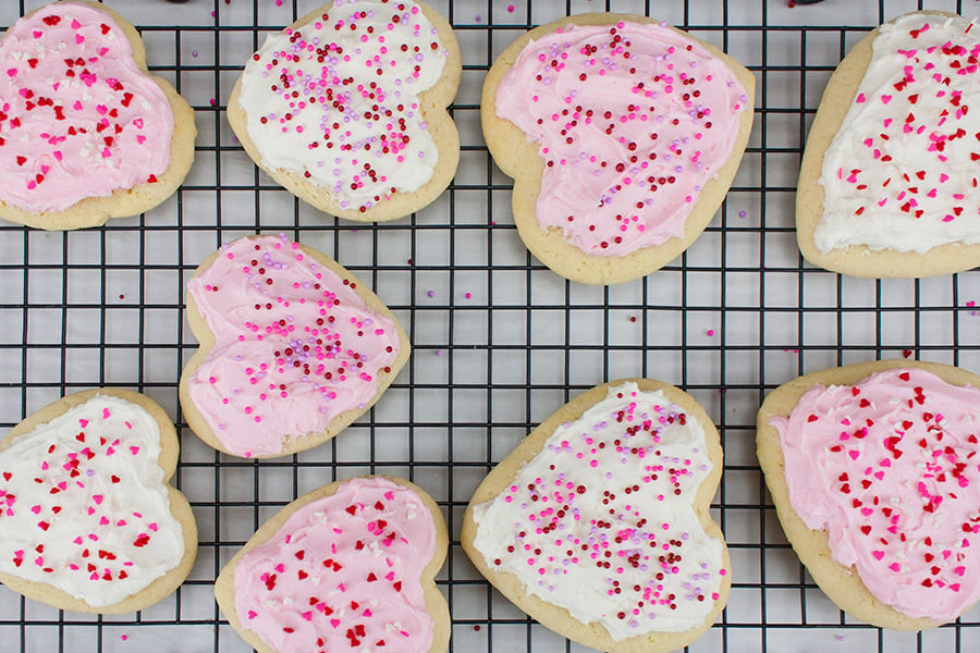 Soft Frosted Sugar Cookies on a wire rack.