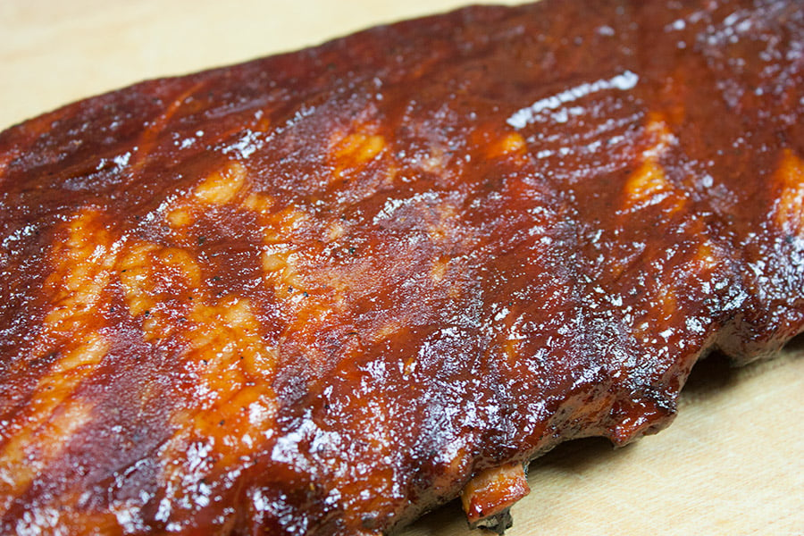 Closeup of smoked St Louis Style Ribs .