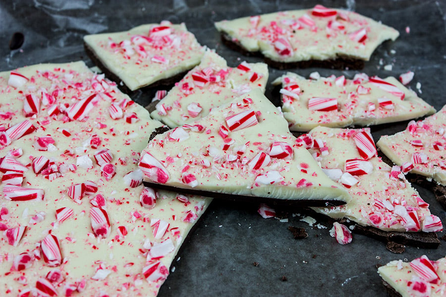 Peppermint bark broken into pieces on baking sheet.