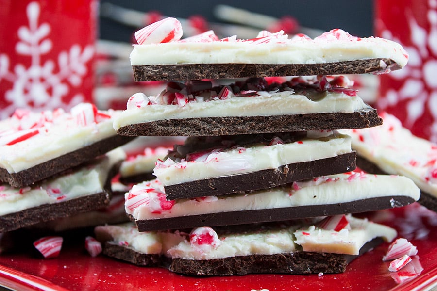 Dark chocolate peppermint bark stacked on plate.