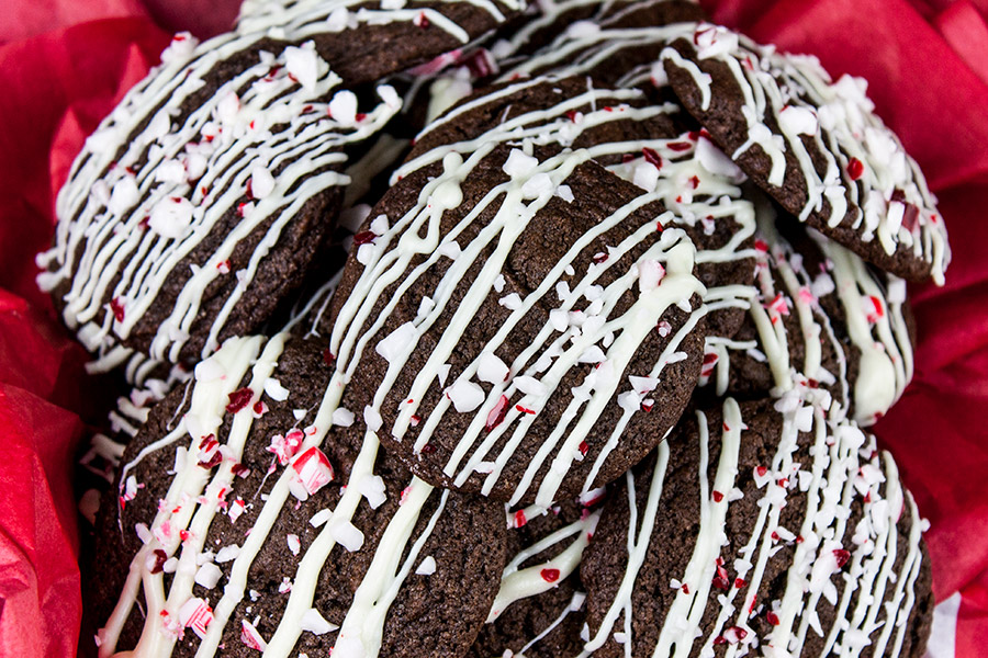 close up of chocolate peppermint cookies on red tissue paper