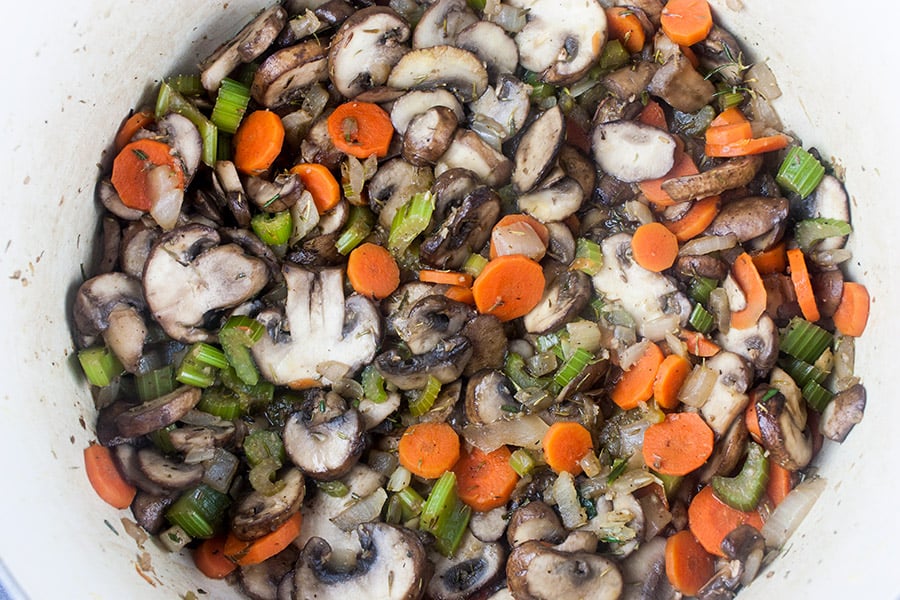 Wild Rice and Mushroom Soup - celery, carrots, onion and mushrooms sauteed in dutch oven