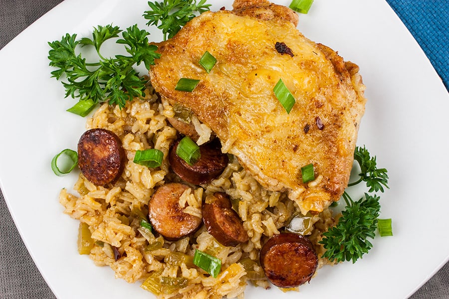 One Pot Chicken and Dirty Rice - Add a little Cajun spice to your dinner tonight! Spicy, creamy, delicious and ready in 30 minutes!