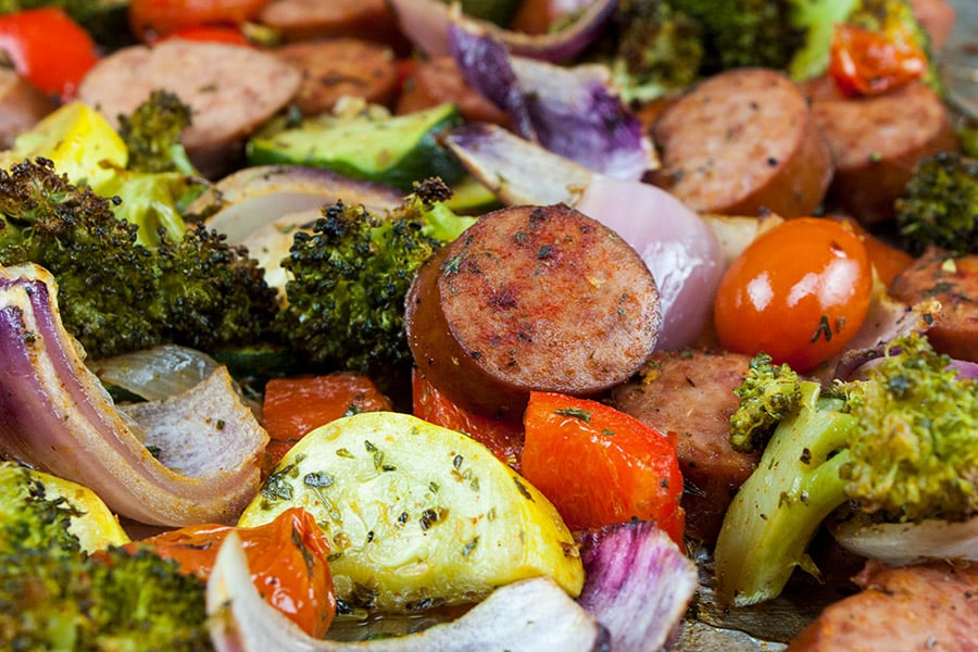 Sausage and vegetables baked on a sheet pan