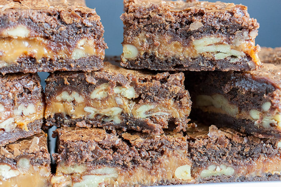 Ultimate Turtle Brownies - Deliciously rich fudgy brownies oozing with creamy caramel and loaded with pecans! Easy to make and great for parties.