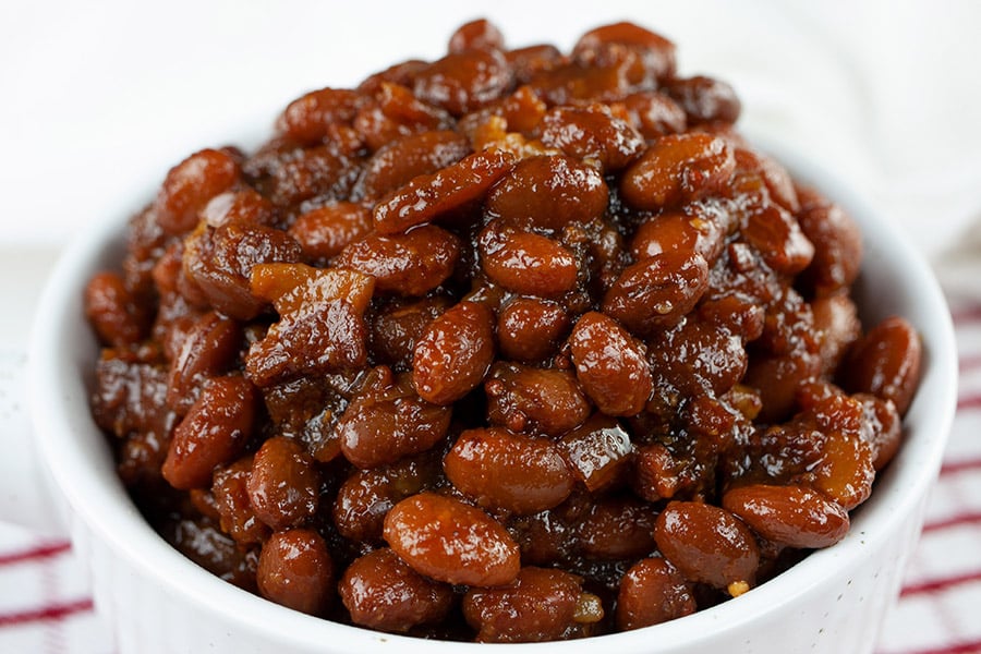 slow cooker boston baked beans in a white bowl