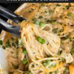 Chicken tetrazzini in a white baking dish with a serving on a dark plate.