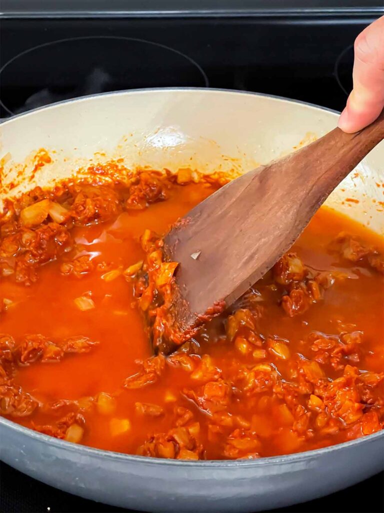 Vodka sauce cooking in a skillet.