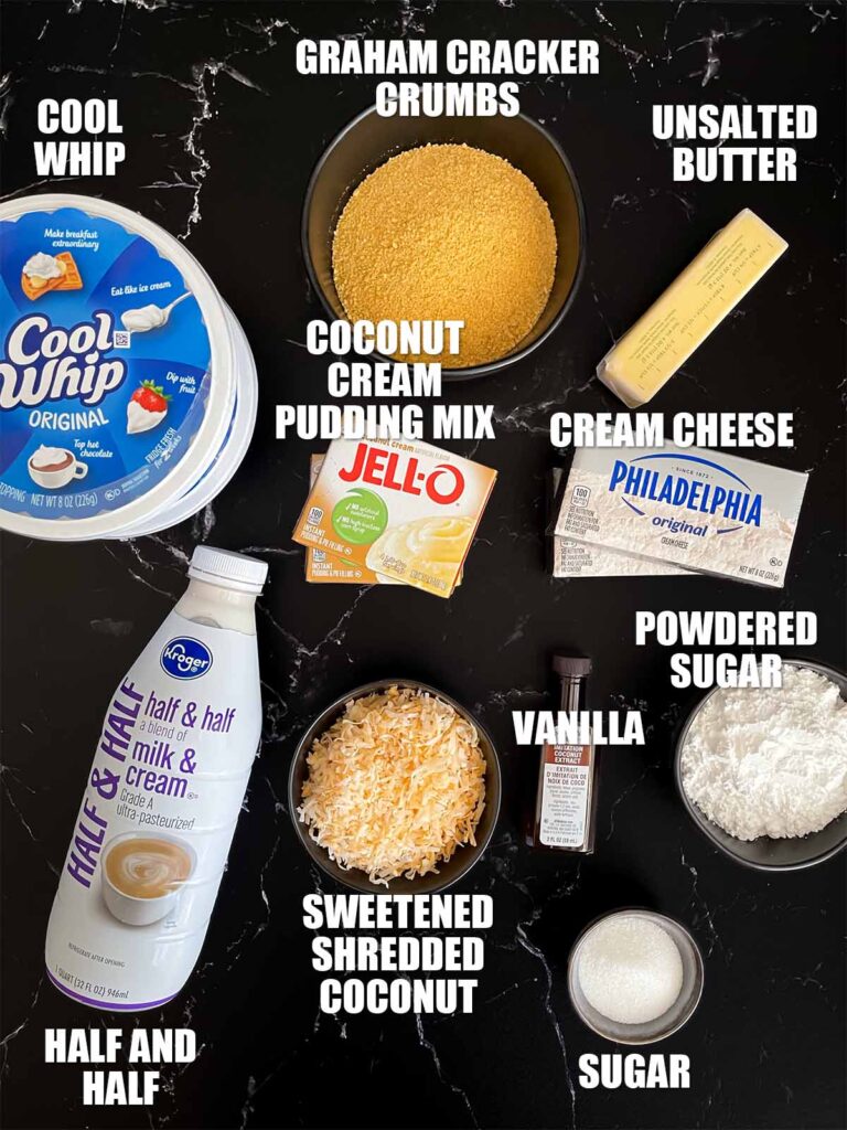 Coconut cream lush recipe ingredients on a dark surface.