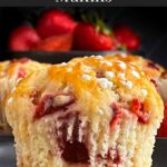 A strawberry muffin on a dark plate on a dark surface.