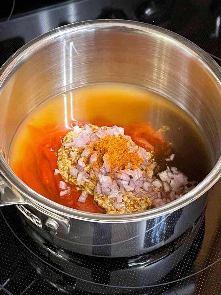 Ingredients in a sauce pan to make Carolina barbecue sauce.