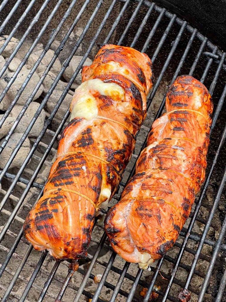 Grilled Cuban pork tenderloin on the grill.