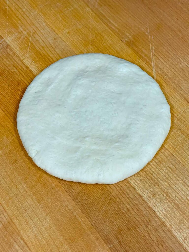 Calzone dough ready to be rolled out.