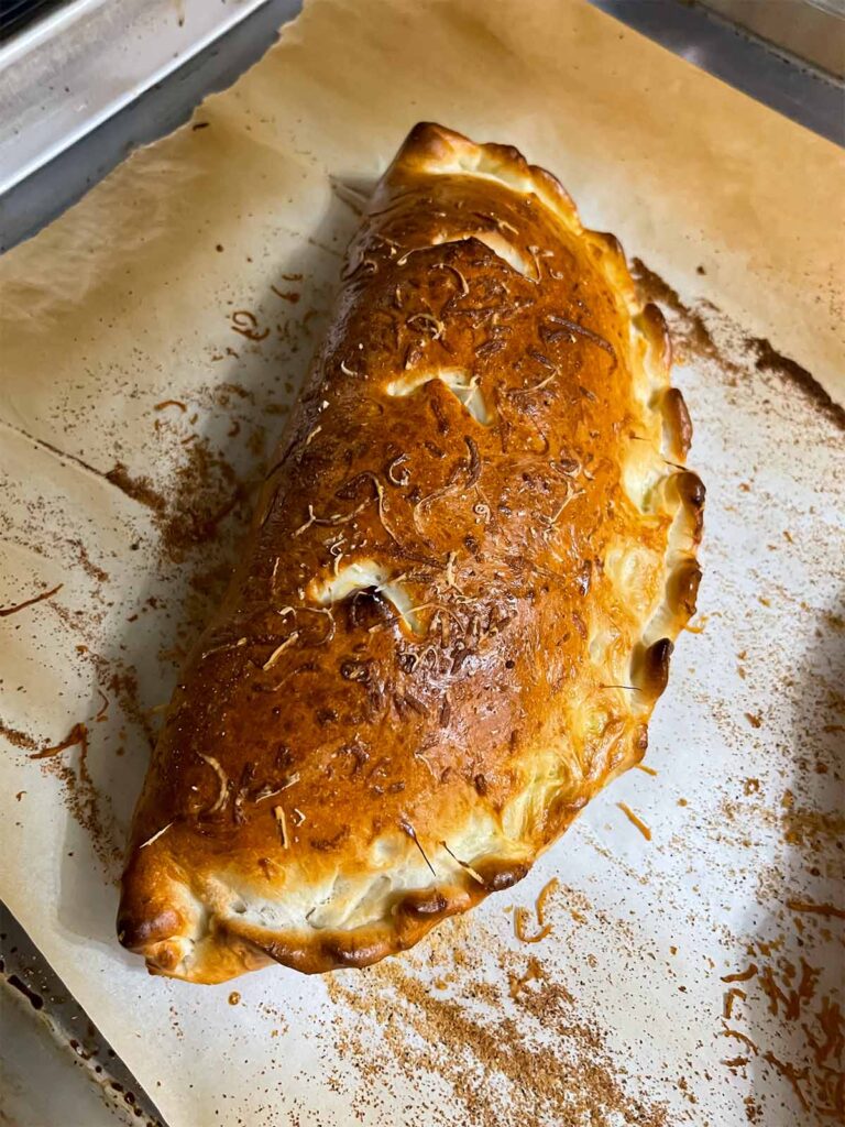 A calzone right from the oven.