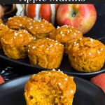 Pumpkin apple muffin on a dark plate.