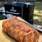 A Texas style smoked pork loin on cutting board.