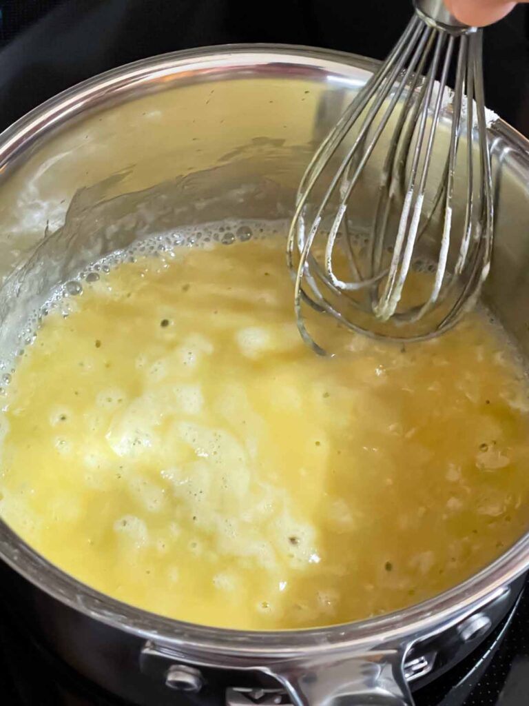 Flour whisked into the melted butter for the chicken and wild rice soup milk mixture.