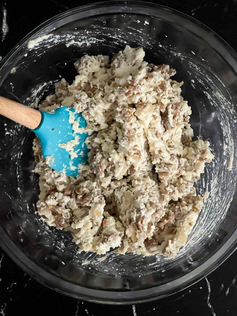 A stuffed shell mixture in a glass bowl.