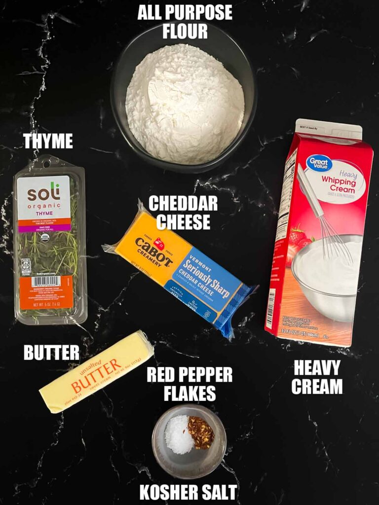 Ingredients needed to make cheddar cheese and herb straws.