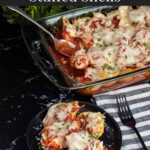 Italian sausage stuffed shells in a casserole dish with a serving on a black plate.