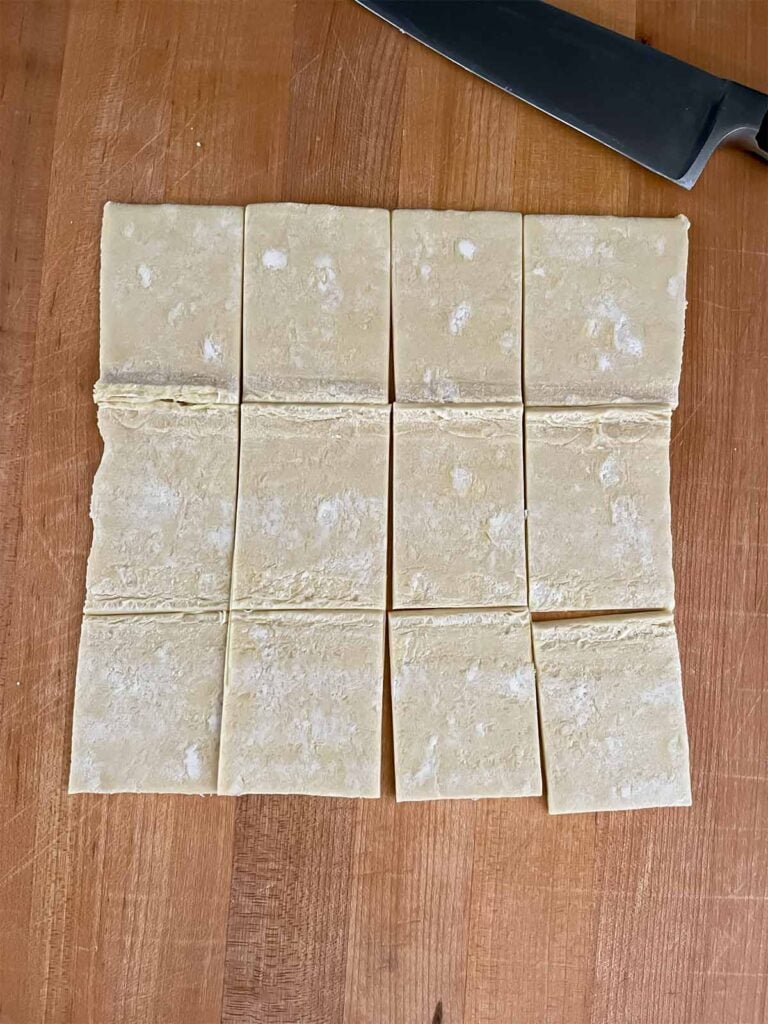 Puff pastry cut into equal squares.