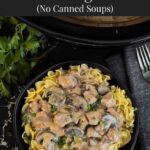 Slow Cooker Beef Stroganoff in a black bowl, garnished with chopped parsley.